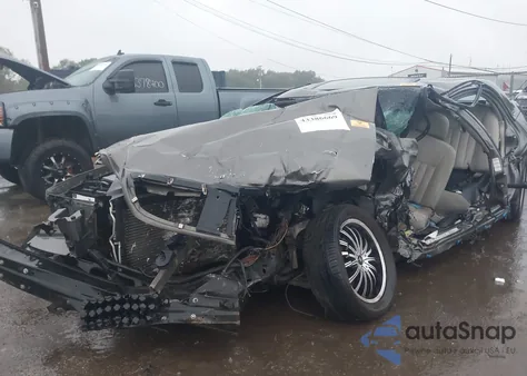 2003 Lincoln Town Car Signature z USA, uszkodzony, nr VIN 1LNHM82W83Y687270